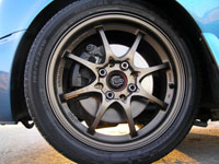 Front Nissan N15 SSS AD22VF brakes with 26mm wide discs visible through 15inch Konig Helium lightweight rims